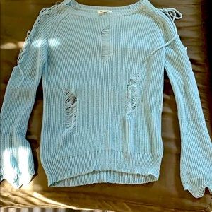 light blue sweater